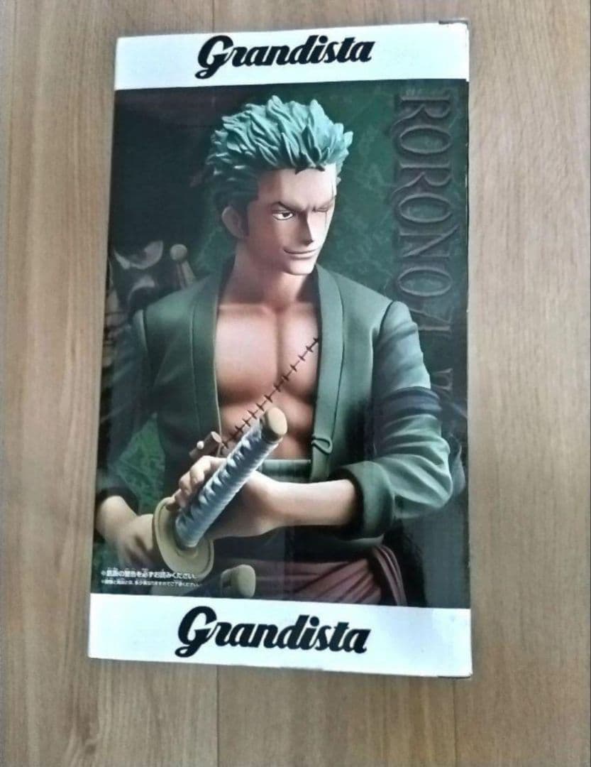 ワンピース ゾロ フィギュア&着るフリース&ゾロ マグネット&非売品零巻セット ワンピース ゾロ フィギュア&着るフリース&ゾロ マグネット&非売品零巻セット