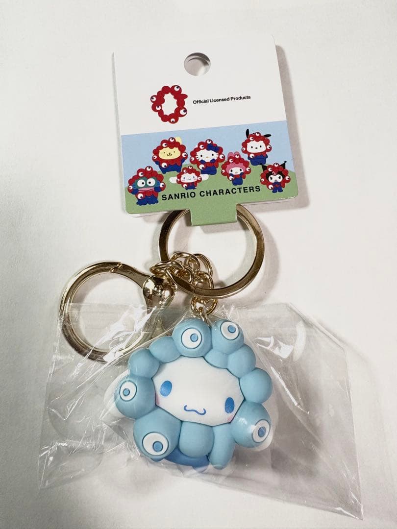 万博　サンリオ ミャクミャクシナモン　キーホルダー 500円引き 新品 クリア シナモンロール ミャクミャク なりきり