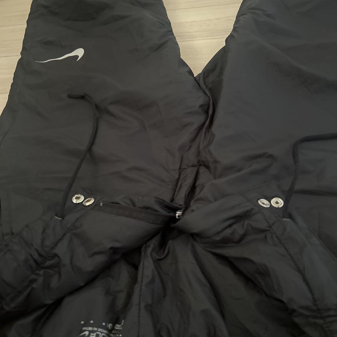 NIKE GOLF　黒い中綿パンツ　Mサイズ　防寒・冬のゴルフ　ラウンドに NIKE GOLF 黒い中綿パンツ Mサイズ 防寒・冬のゴルフ ラウンドに