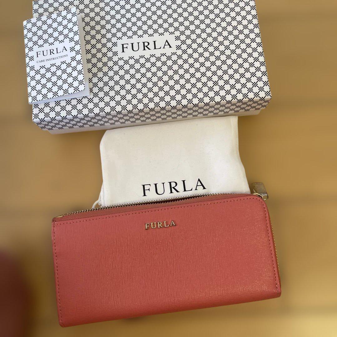 FURLA ピンク 二つ折り財布 - メルカリ