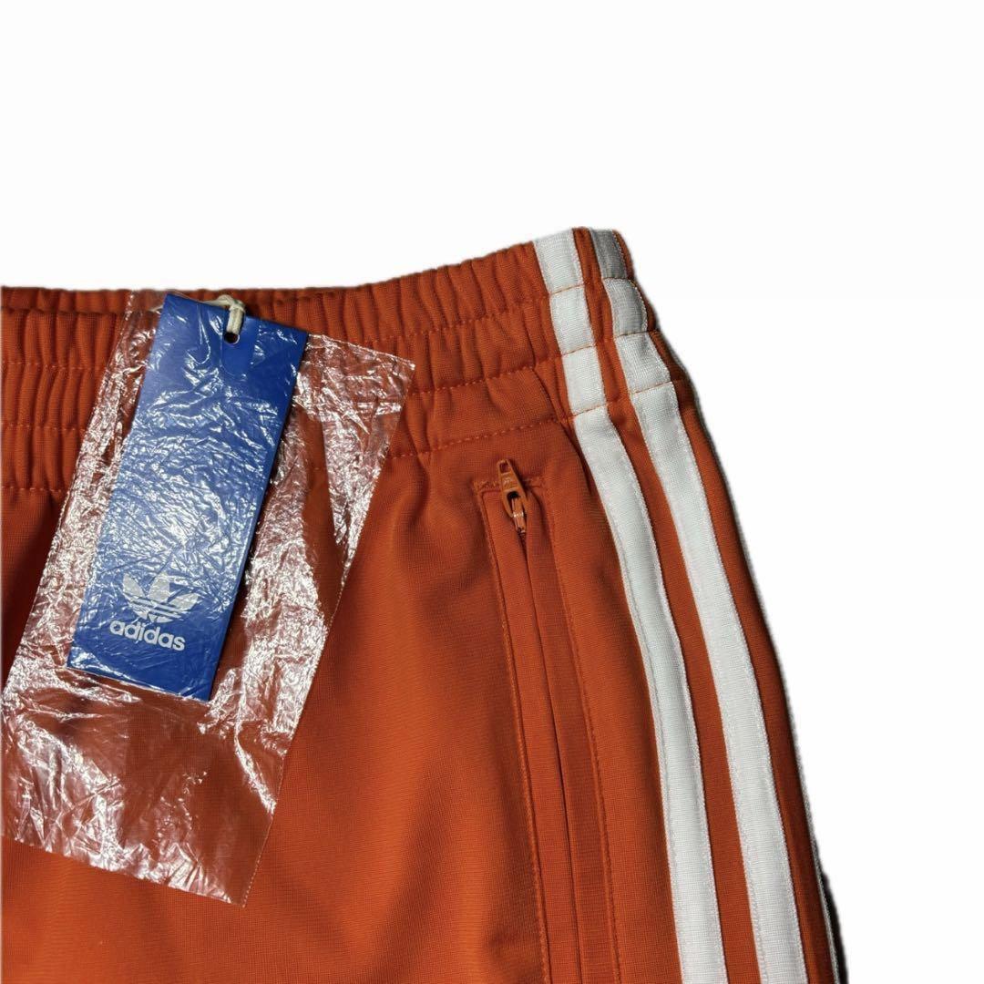 新品 アディダス ファイヤーバード トラックパンツ オレンジ L