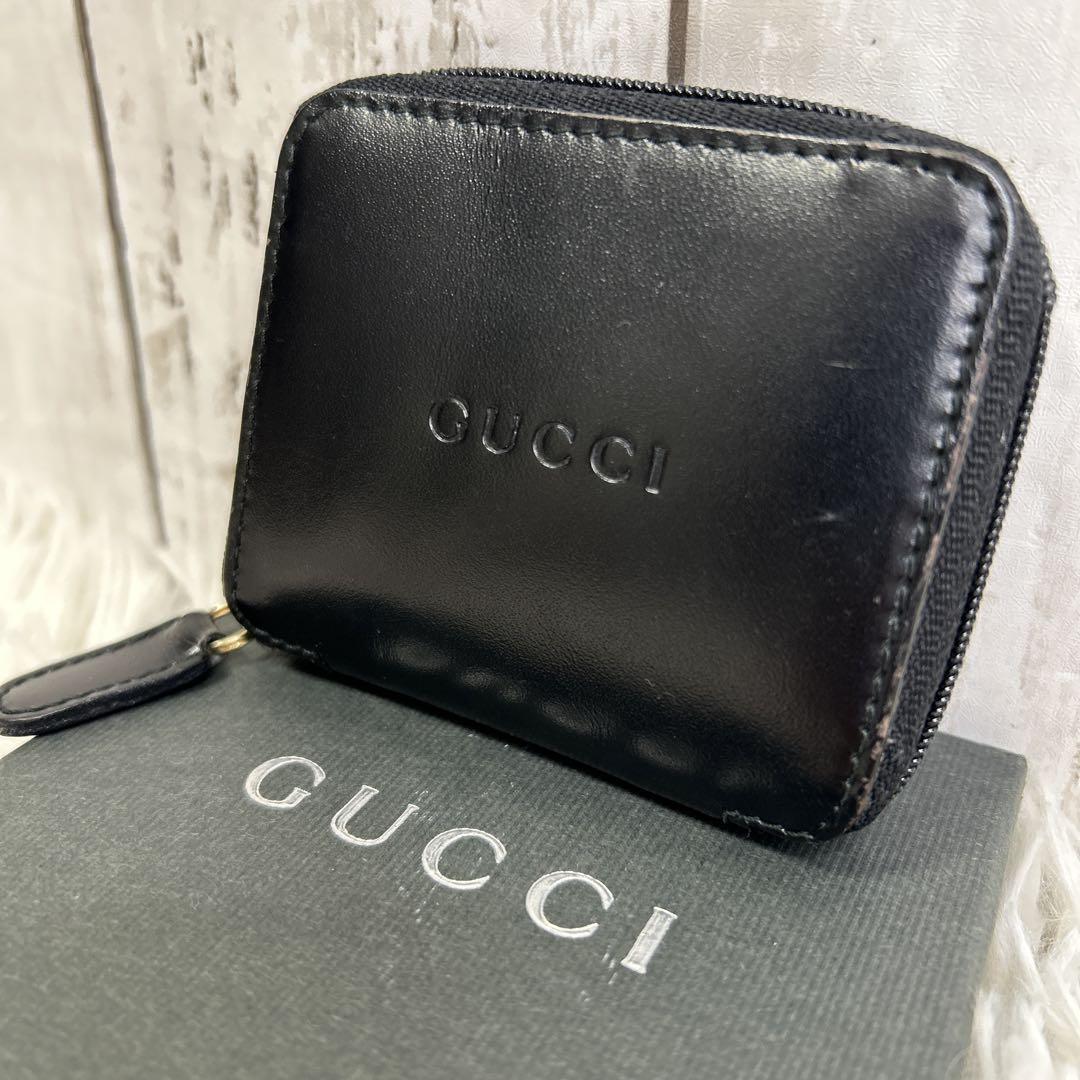 GUCCI レザー　コインケース　小銭入れ　型押しロゴ　ブラック　箱付き