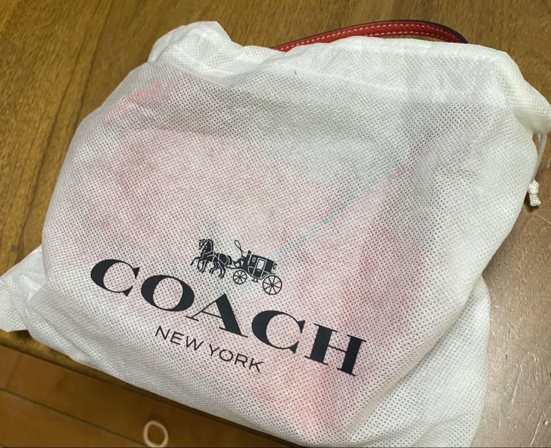 COACH レッド恐竜モチーフバッグ