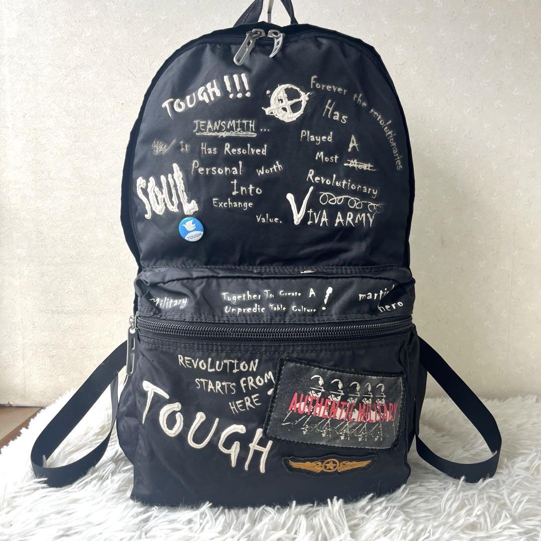 TOUGH JEANSMITH 総柄リュック 缶バッジ付き ブラック 大容量