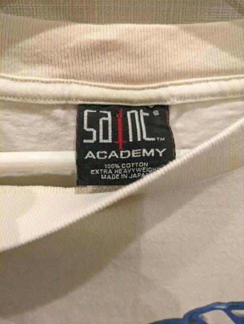 SAINT Mxxxxxx × SHERMER ACADEMY T-shirt