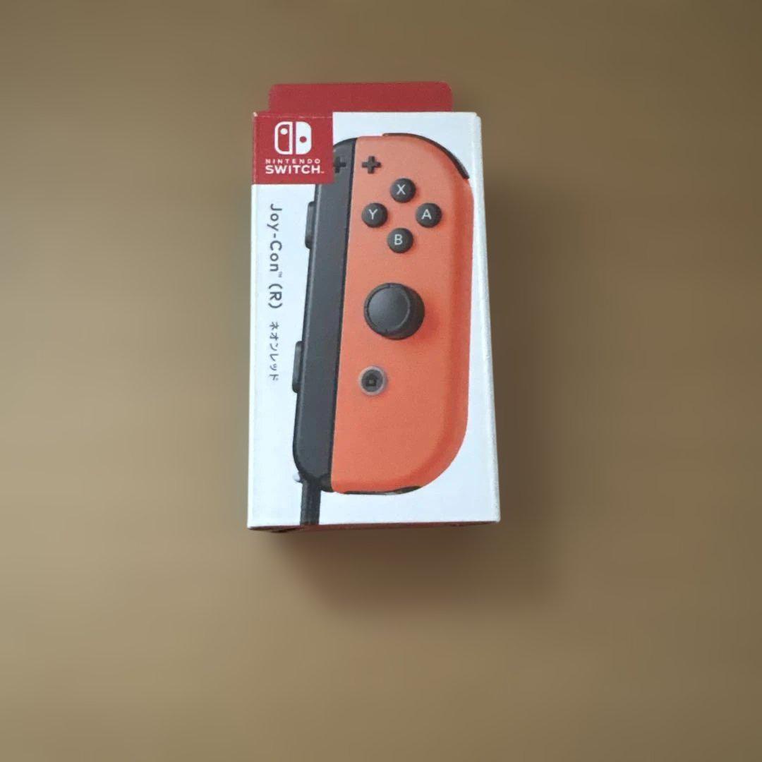 ワイヤレスコントローラー、緑と赤のJoy-Con×、黒いJoy-Conグリップ