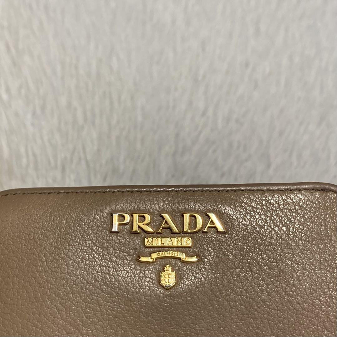 激安通販特集！ 早い者勝ち美品PRADA プラダ二つ折りミニL字ファスナージップ金 小物