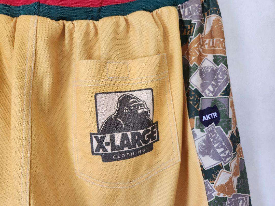 XLARGE ×AKTRコラボバスケットボールパンツ メッシュ 黄色