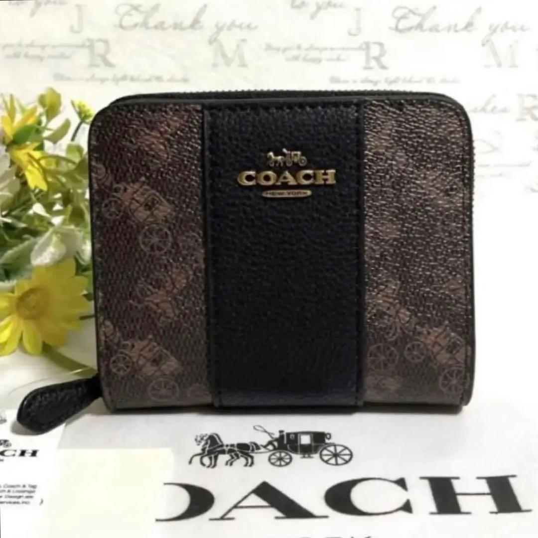 新品同様 新作新品 コーチ ブラウン ホース&キャリッジ 二つ折財布
