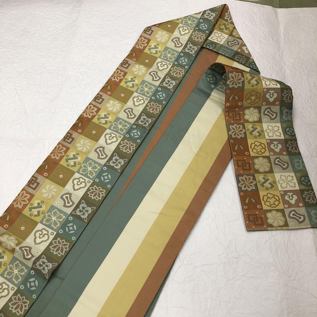 逸品 西陣 川島織物 正絹 名古屋帯 宝尽くし 七宝 市松 - メルカリ 逸品 西陣 川島織物 正絹 名古屋帯 宝尽くし 七宝 市松 - メルカリ