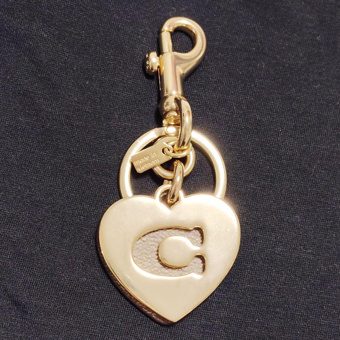COACH - コーチ職　ハート形引き付ける　御徒面子引き付ける　名書き　ゴールド　赤銅色　美品 ファッション-レディース