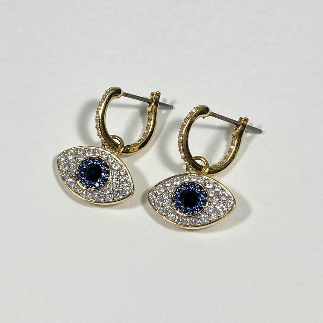 SWAROVSKI Symbolica ドロップピアス イーブルアイ 人気商品】SWAROVSKI Symbolica イーブルアイ ピアス - メルカリ