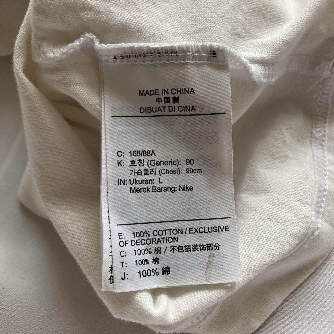 入手困難 NIKE ナイキガール Tシャツ ホワイト カットソー 古着 Lサイズ