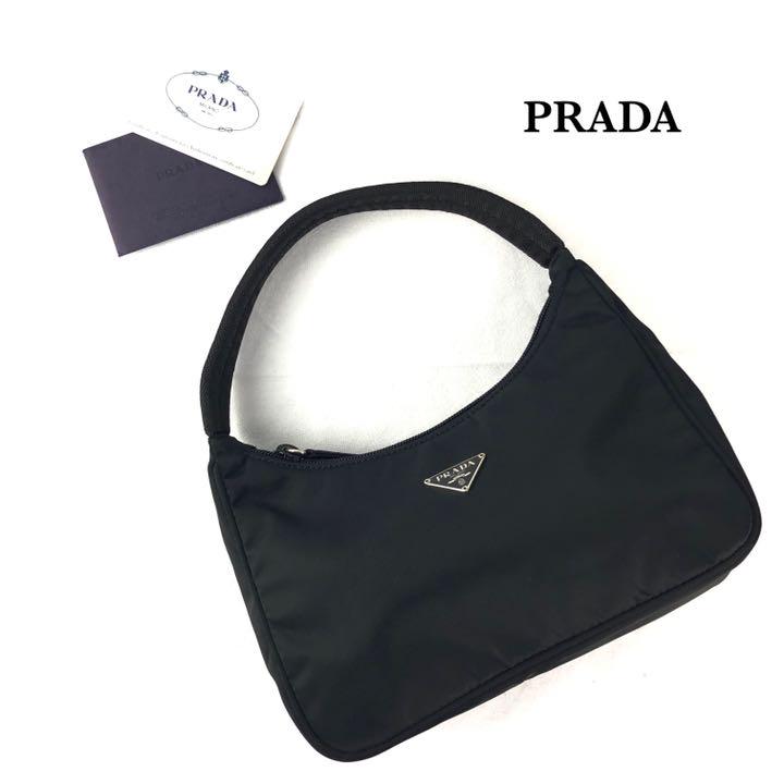 未使用 PRADA ハンドバッグ アクセサリーポーチ 三角プレート 黒 保証書付