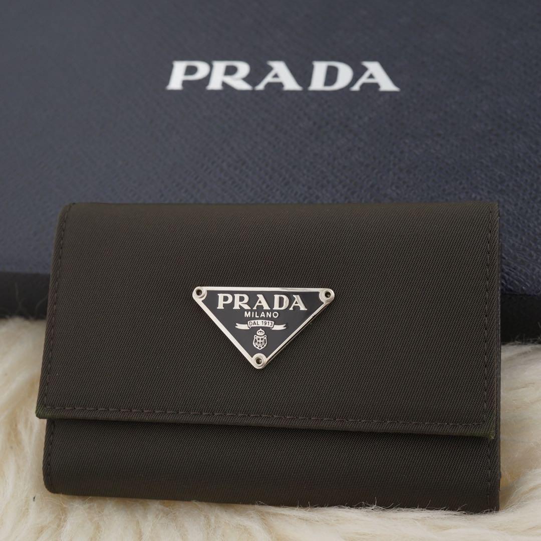 新品未使用品】PRADA プラダ 6連キーケース ナイロン 三角プレート 茶-