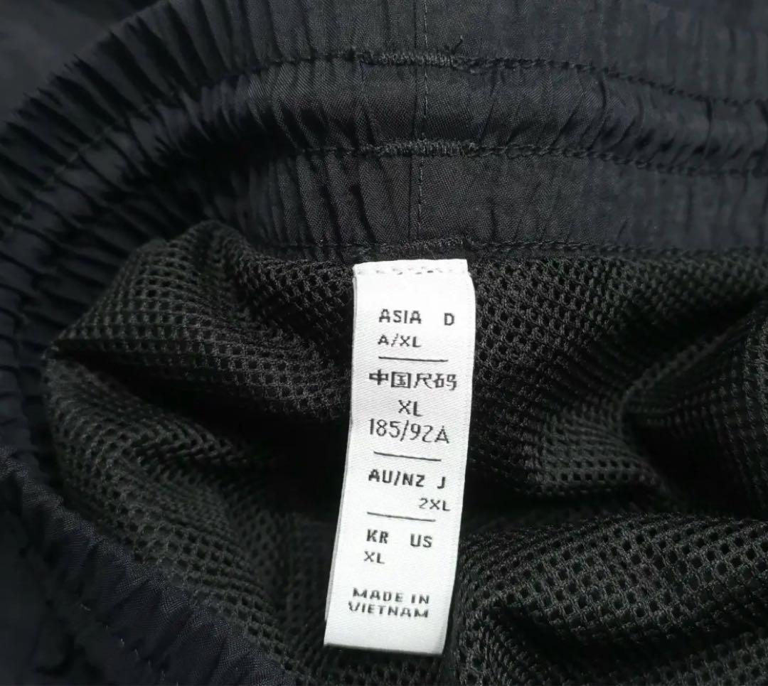 新品XL ADIDAS REKIVE WOVEN トラックパンツ IL2462