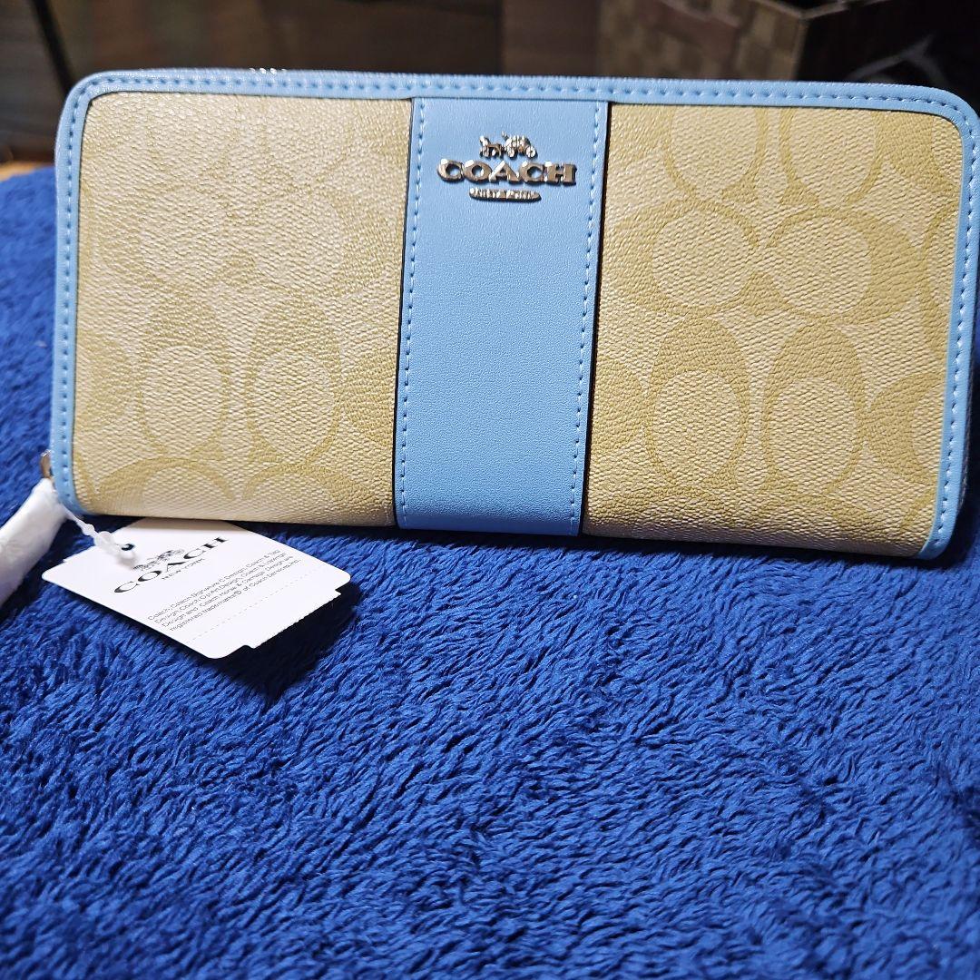 驚きの価格が実現！ 新品未使用】COACHコーチ 水色 シグネチャー 長財布 小物