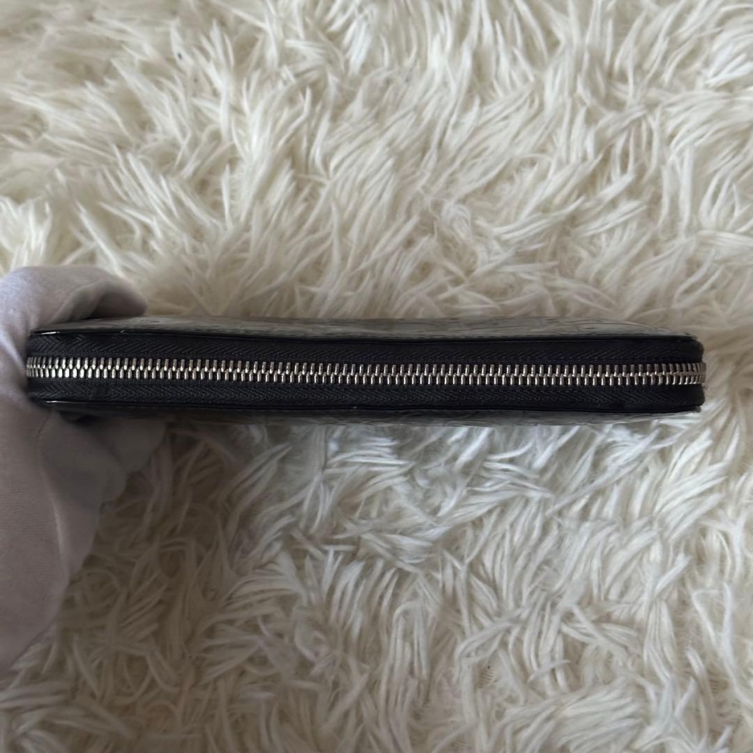 クリスチャンディオール トロッター ラウンドジップ 長財布 光沢 レザー 黒