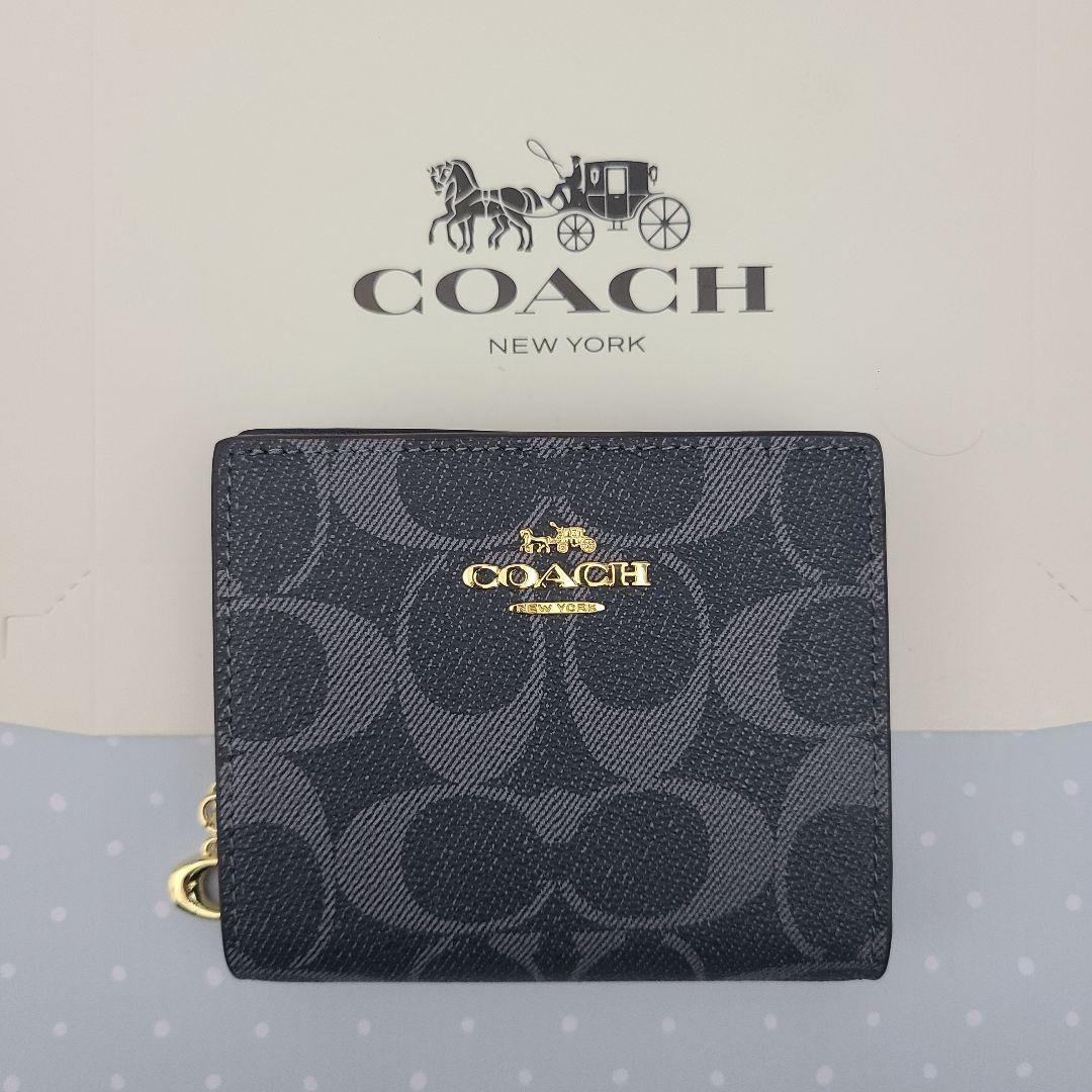 COACHコーチ折りたたみ財布　レディースのミッドナイト色新品財布