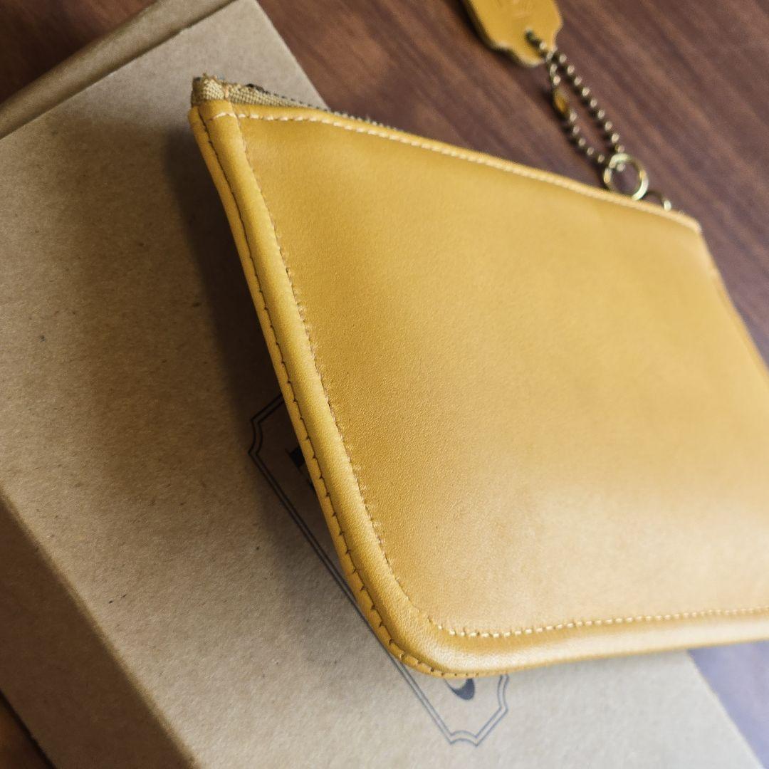 COACH スキニーポーチ 7170 イエロー