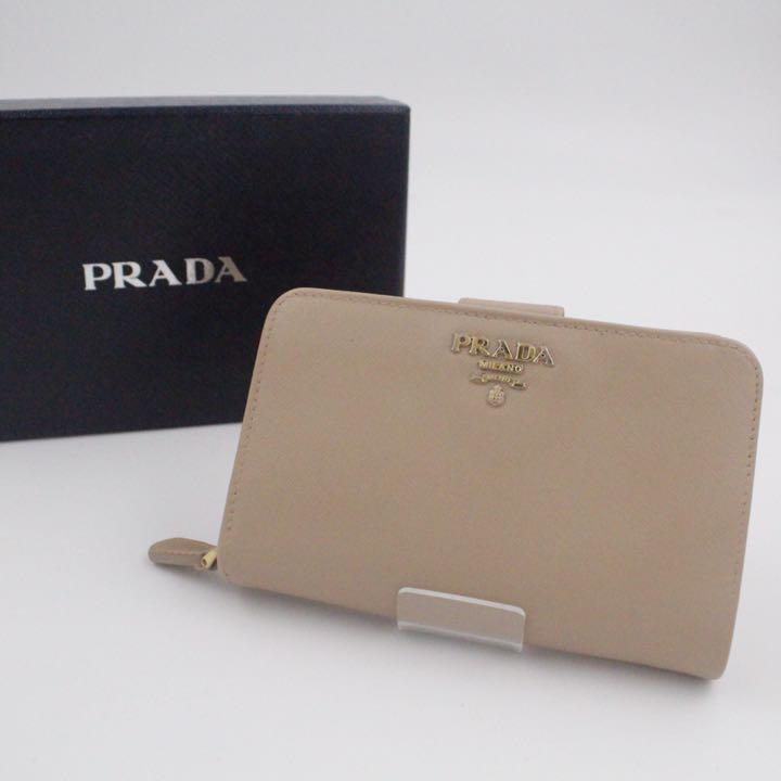 48%割引ブラウン系何でも揃う ✨美品✨プラダ ミニ財布 ベージュ 販売取寄 PRADA ミニ 折り財布 折り財布