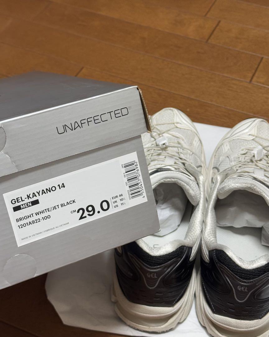 × Asics