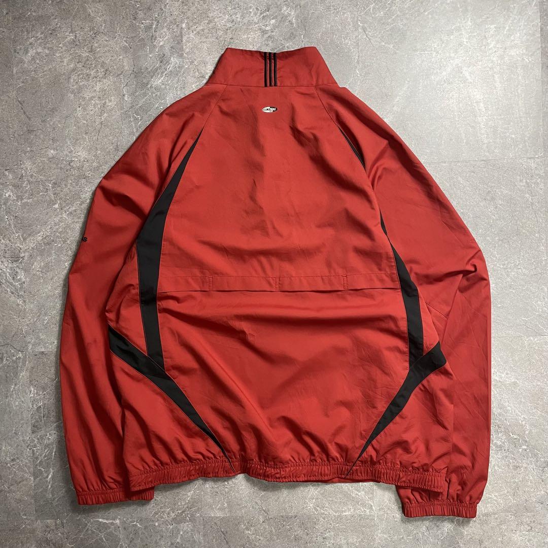 adidas〈ハーフジッププルオーバートップ 00s レッド TECH L〉