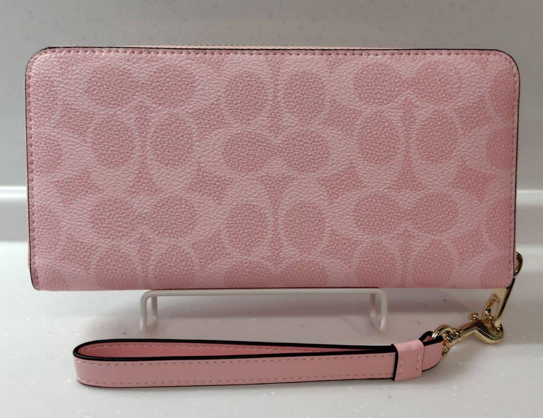 COACH ピンク 長財布 ストラップ付き