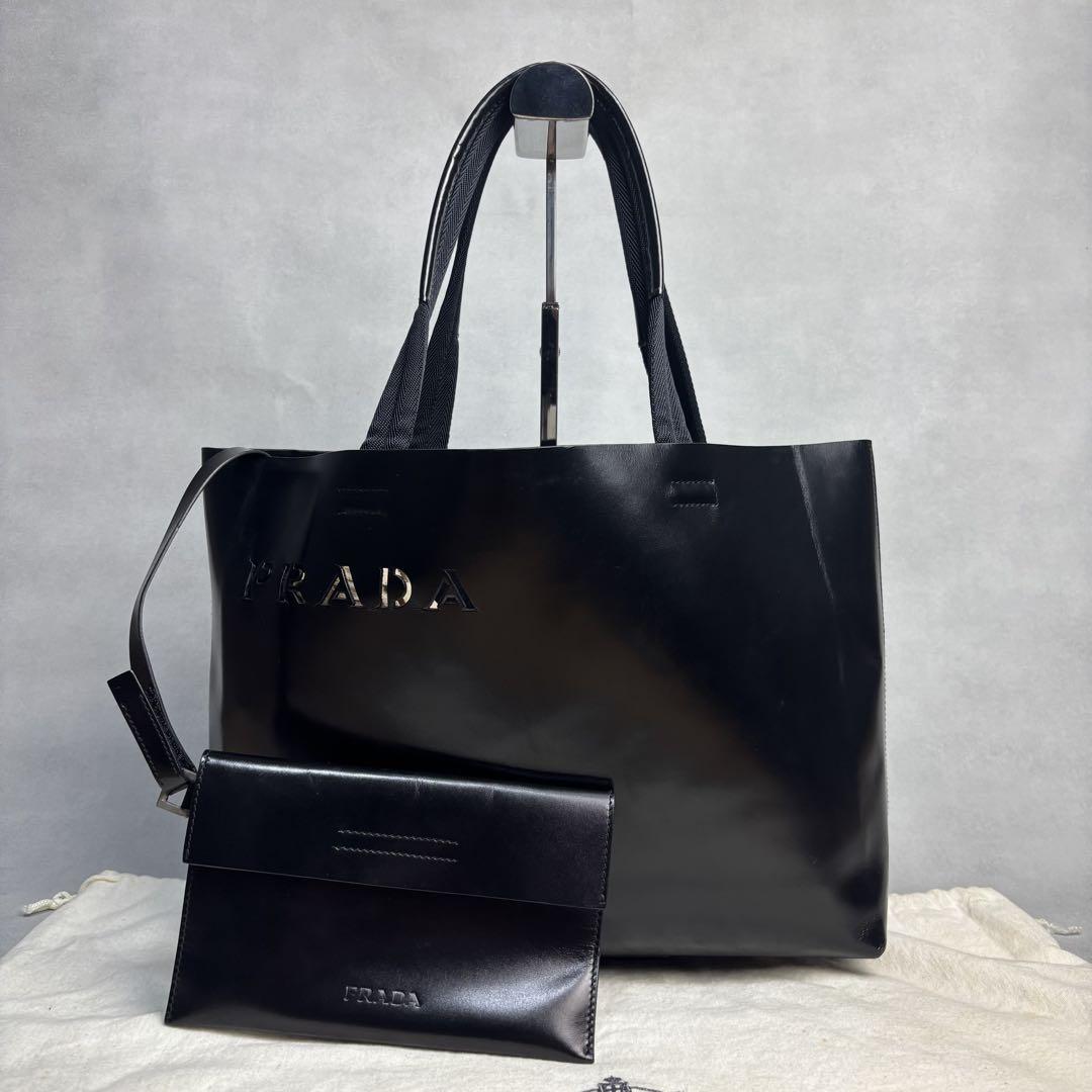 【正規品】プラダ トートバッグ カットワーク ロゴ 白タグ 肩掛け A4可 茶 美品✨正規品 プラダ トートバッグ カットワーク ロゴ 肩掛け A4