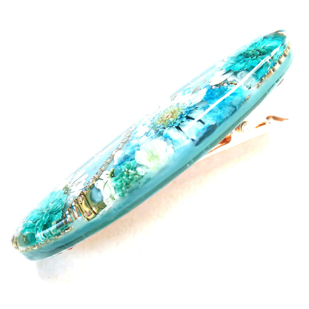 ヘアクリップ レジン 6.5cmオーバル 美しいマトリカリア 水色