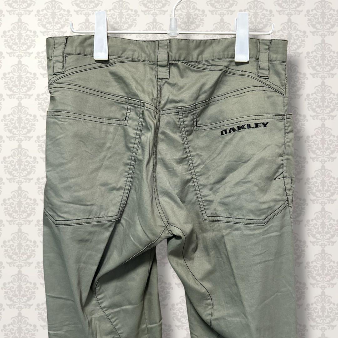 ☆新品未使用タグ付き☆限定オークリーゴルフパンツ　ストレッチ　34 Oakley - オークリー ストレッチパンツ ゴルフウェア 34 Lサイズ