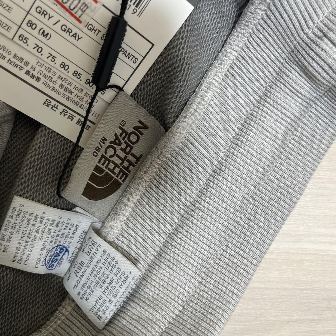 新品 ノースフェイス スウェットパンツ ワイド ドローコード付 グレー メンズM 新品 ノースフェイス スウェットパンツ ワイド ドローコード付 グレー メンズM