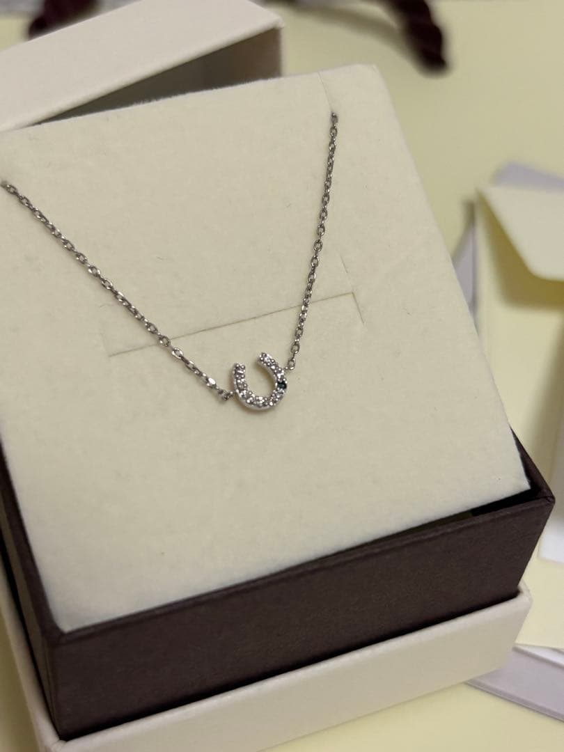 ホースシュー ブレスレットCHARMY プラチナ ダイヤモンド ブルーダイヤ