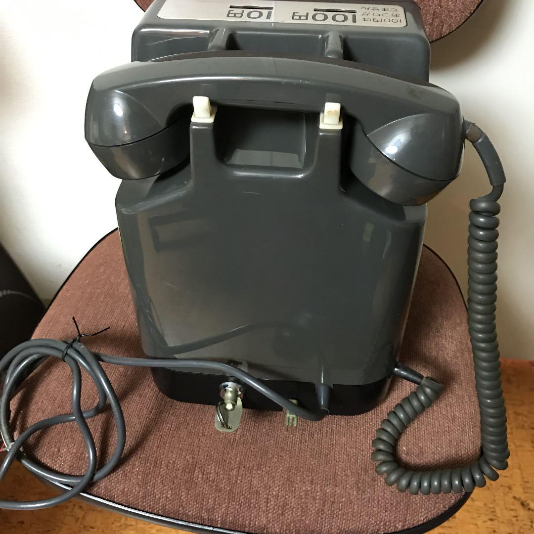 公衆電話器