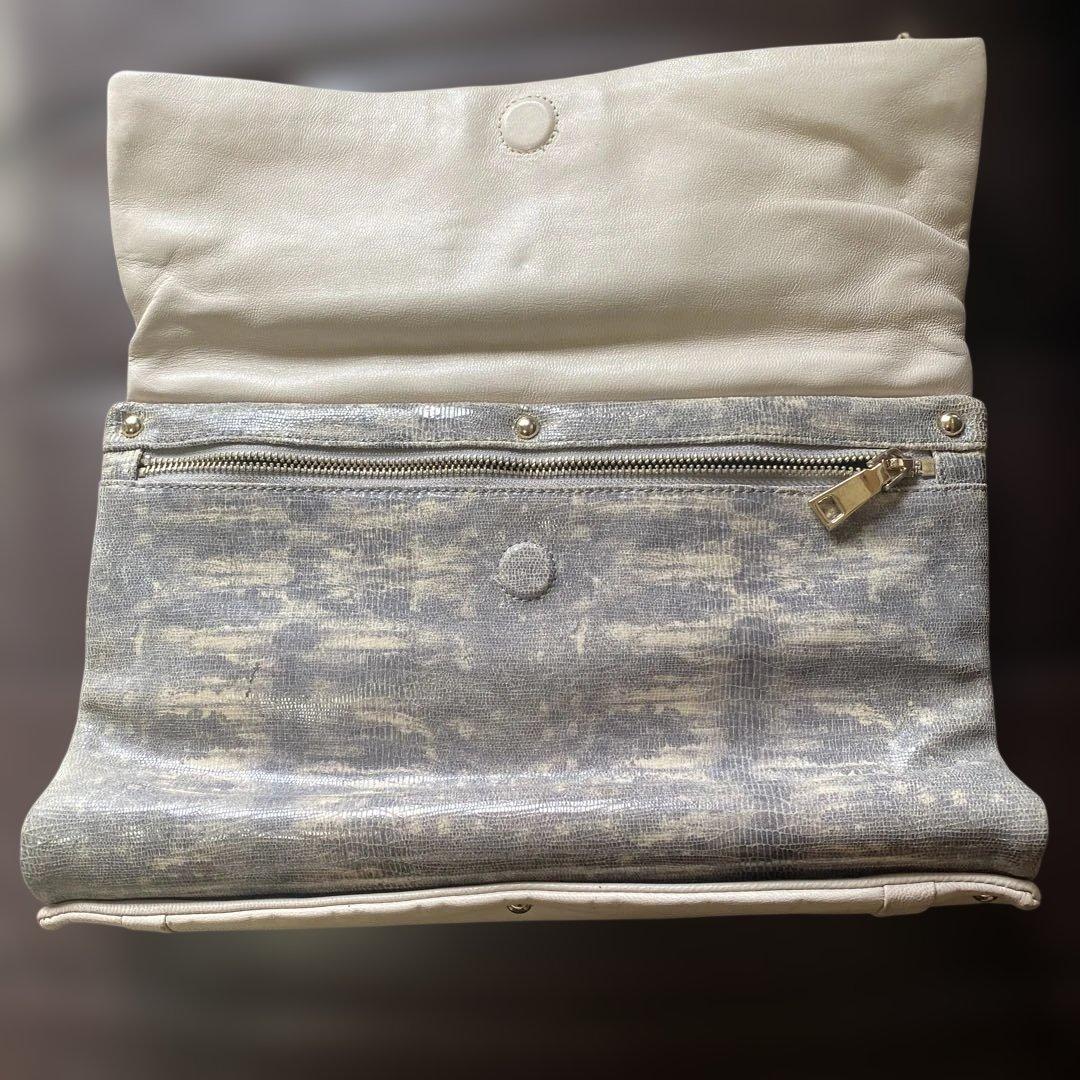 story. Large White Leather Clutch Bag