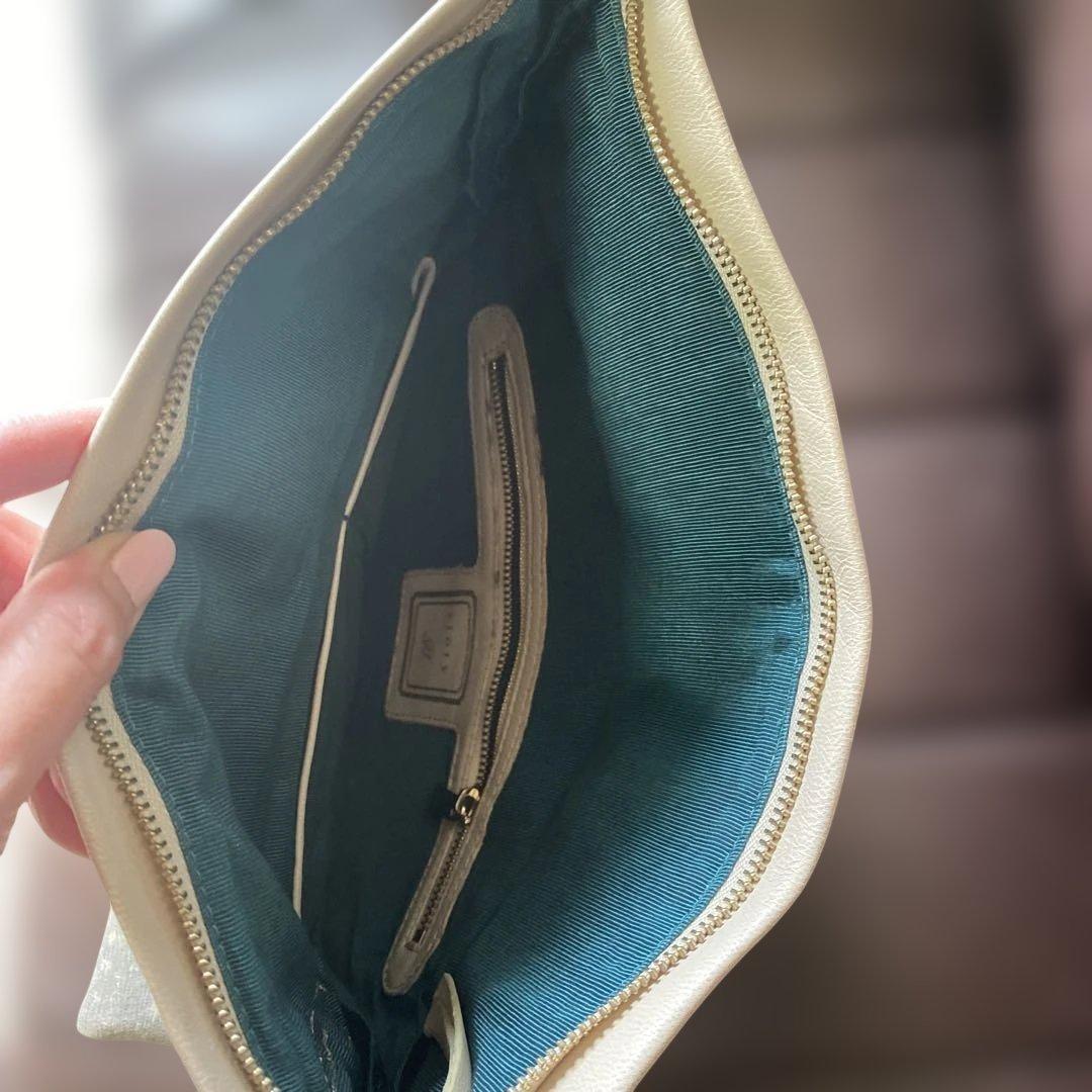 story. Large White Leather Clutch Bag