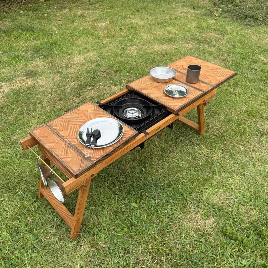 ヘリンボーン天板IGTテーブル 無骨キャンプに 折りたたみチーク色 折りたたみキャンプテーブル｜フラットバーナー対応