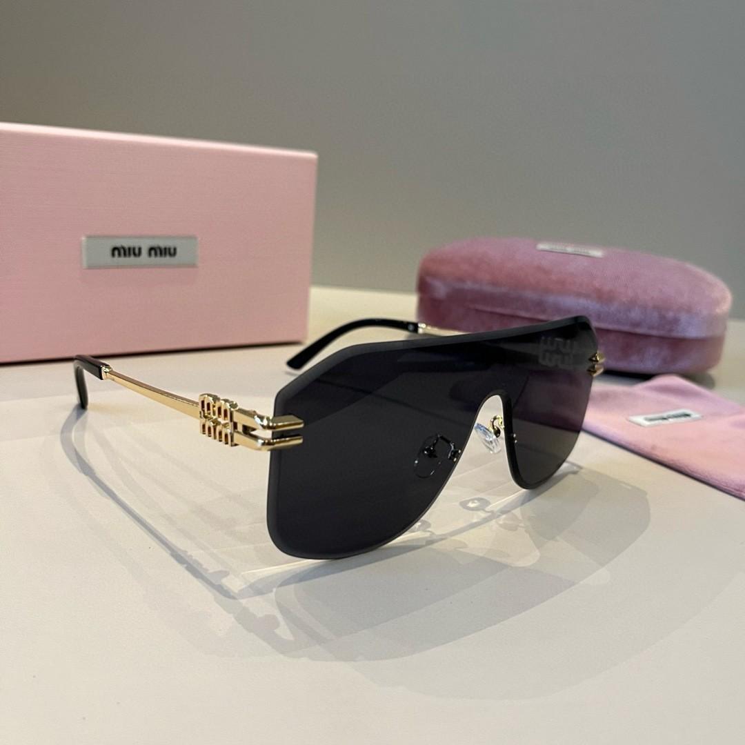 MIU MIU - miu miu ブラック オーバルサングラス ケース付きの