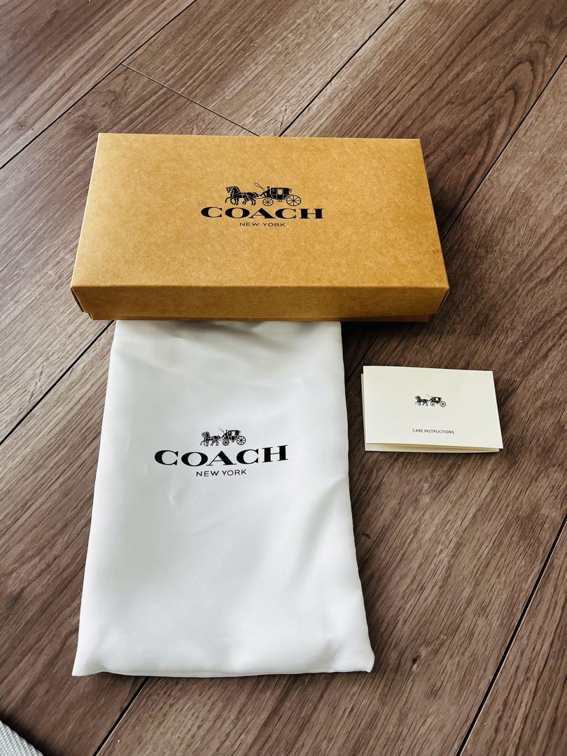 COACH フラワープリント 二つ折り財布