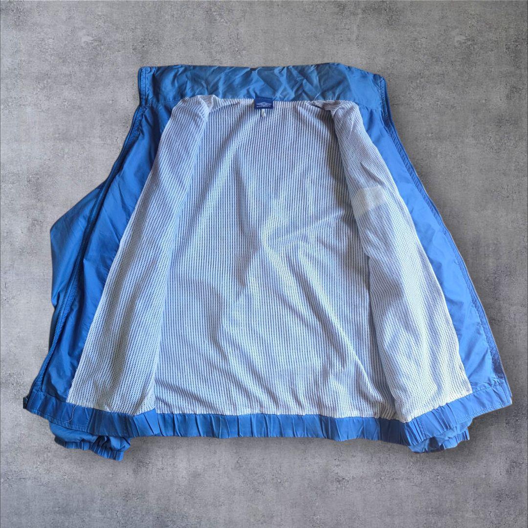 90s Umbro ナイロントラックジャケット 刺繍ロゴ アイスブルー