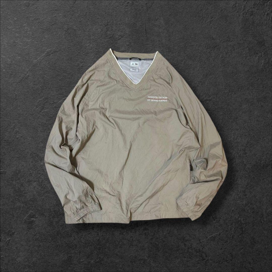 2012年製adidas古着ナイロンプルオーバー企業ロゴ刺繍ロゴベージュJ52