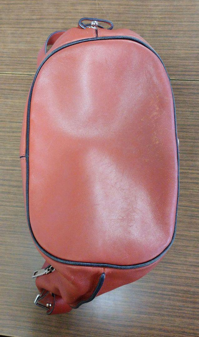 ダークオレンジ系 ×シルバー金具