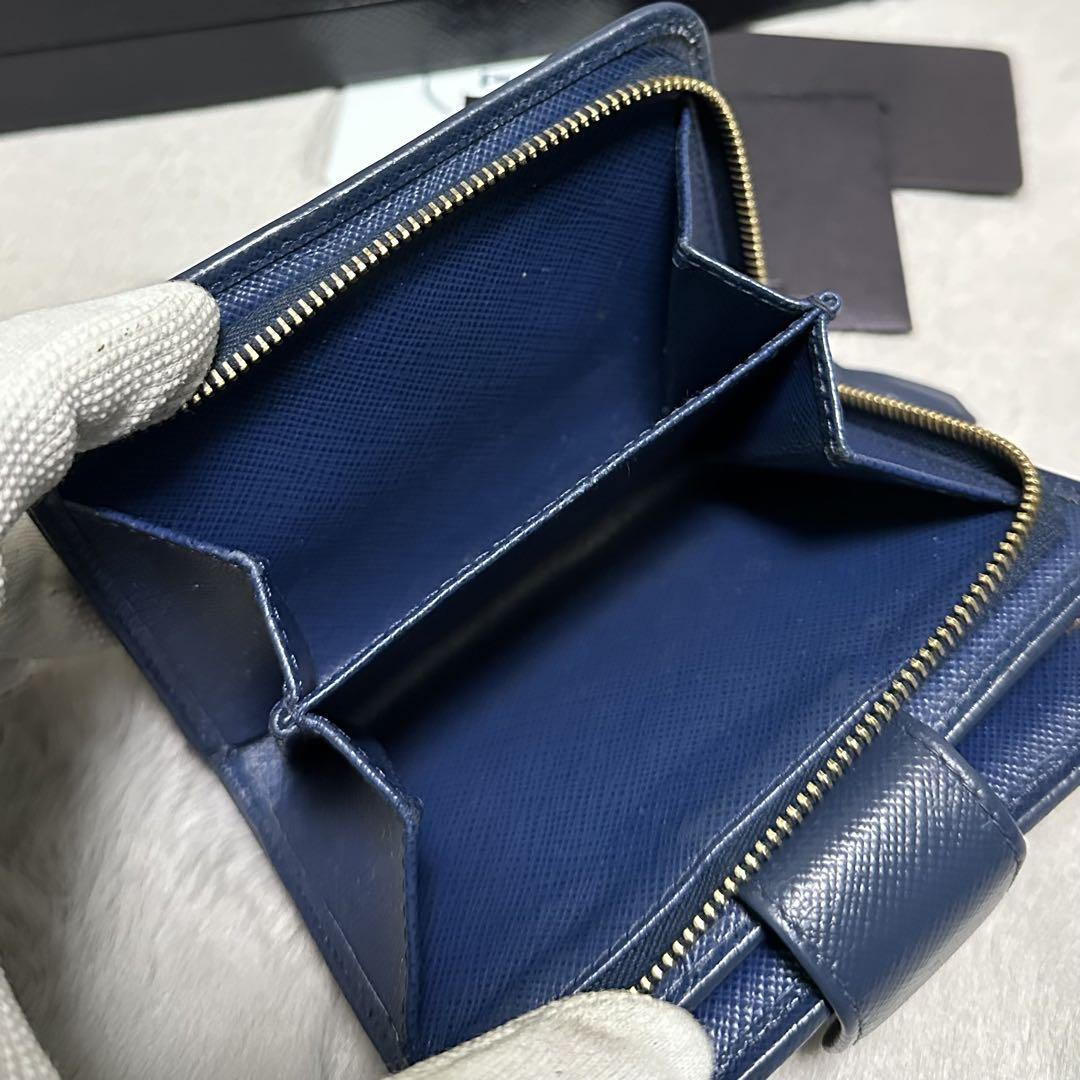 PRADA プラダ　折り財布　ロゴ金具　ブルー　コンパクトウォレット