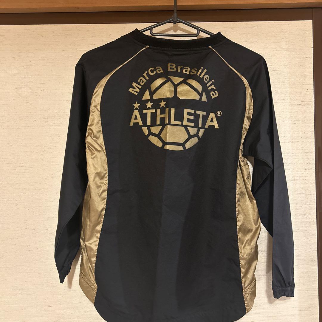おトク情報がいっぱい！ ATHLETA ピステ上下セット 長袖 キッズ140 黒・金 - メルカリ ウェア
