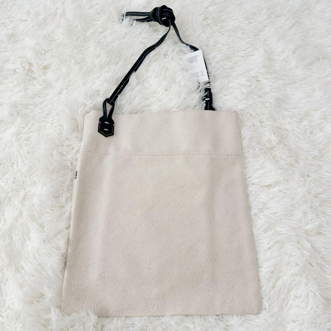 新品 ノマディス BOOK ショルダー バッグ オフホワイト キャンバス