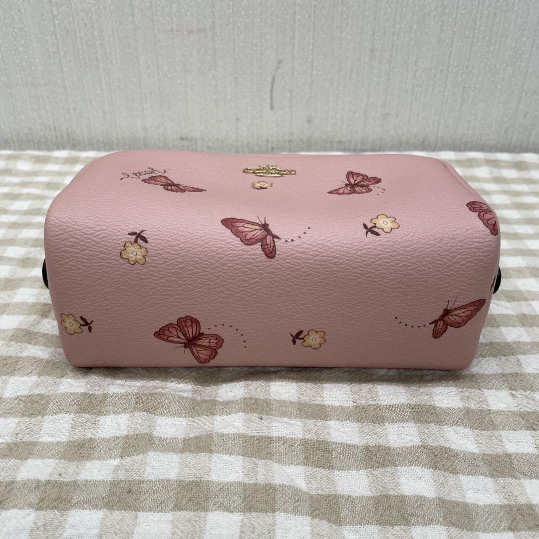 COACH コスメポーチ 花と蝶柄 - メルカリ