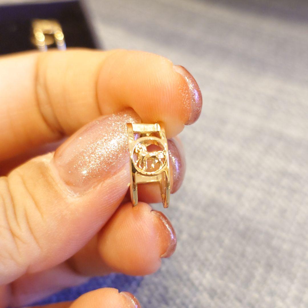 COACH コーチ アイコンピアス イエローゴールド