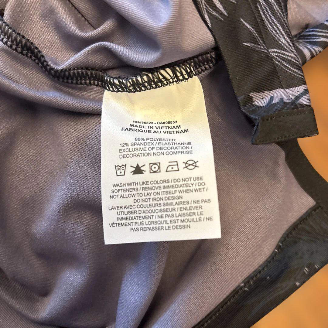 ハワイタートルベイNike DRI-FIT 黒葉柄ポロシャツ ハワイタートルベイNike DRI-FIT 黒葉柄ポロシャツ