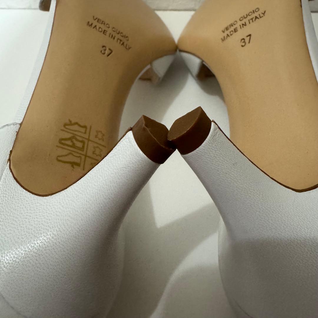 E. オープントゥ