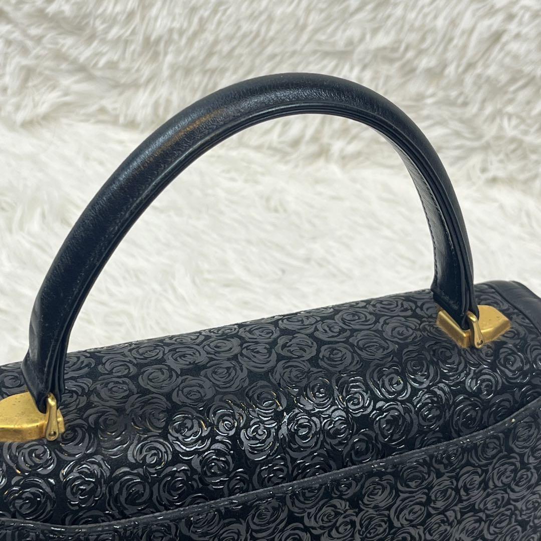 【良品】印傳屋 ハンドバッグ フォーマル 薔薇柄 バラ柄 黒 金金具
